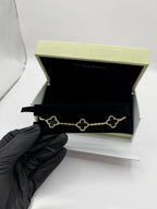 Van Cleef Negra Con Oro